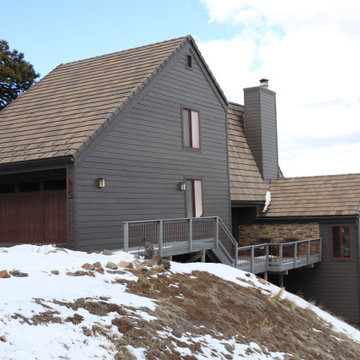 Dark Exterior Remodel | James Hardie Siding with Stone Accents