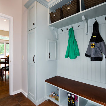 Mudroom featuring laundry chute