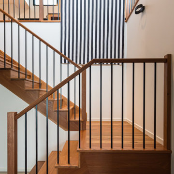 Timber staircase with steel balustrade