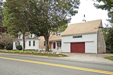 Example of a cottage exterior home design in Boston