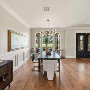 Modern Open-Concept Dining Room with Statement Lighting