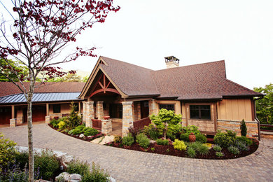 Inspiration for a mid-sized traditional full sun front yard concrete paver driveway in Charlotte for summer.