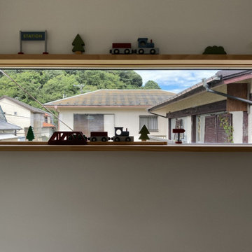 主屋に寄り添う焼杉の壁|北鎌倉の離れ