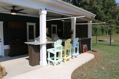 Example of a minimalist patio design in Other