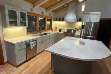 Example of a mid-century modern kitchen design in Other
