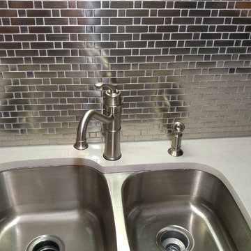 London Grey Caesarstone with Stainless Steel Backsplash
