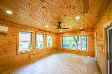 Inspiration for a transitional sunroom remodel in Other