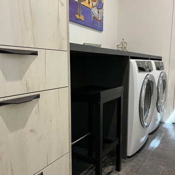 Versatile Laundry Room with Storage and Occasional Workstation