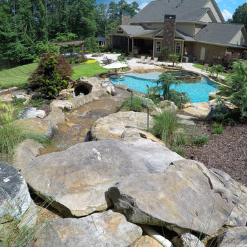 Natural freeform pool with Cave and Beach entry