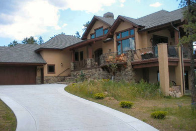 Example of an exterior home design in Denver