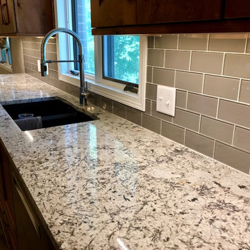 Dura Supreme Cabinets Knotty Alder Butternut Romanix Granite Galley Kitchen