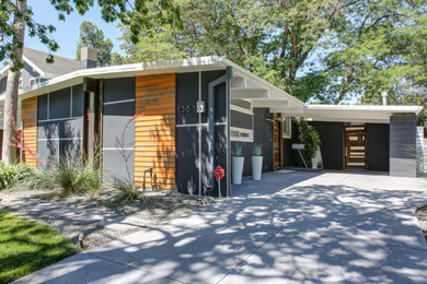 Small 1950s multicolored one-story mixed siding house exterior idea in Denver