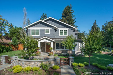 Inspiration for a large craftsman gray three-story wood exterior home remodel in San Francisco with a shingle roof
