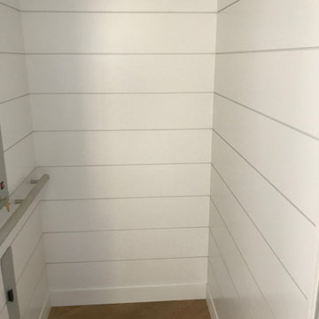 Farmhouse Home Elevator with Custom Shiplap Interior