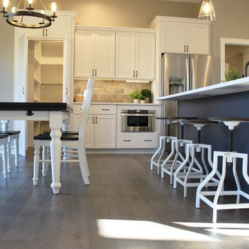 Blue Kitchen Island in Edgebrooke Homes Bettendorf, Iowa Kitchen