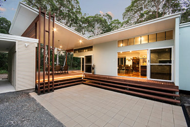 Photo of a beach style home design in Sunshine Coast.