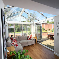 White Conservatory with PVCu Bi-Fold Doors - Products