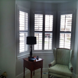 Crestview Shutters using large Deco frame and bi-fold track shutters - Interior Shutters