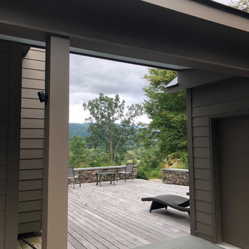 Hardwood deck and fieldstone sitting wall