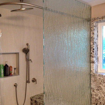 Cascading water shower wall