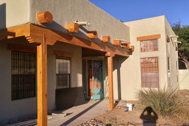 Inspiration for a large southwestern home design remodel in Other