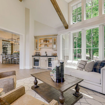 Reclaimed Wood Ceiling Beam in Vaulted Sunroom Living Room
