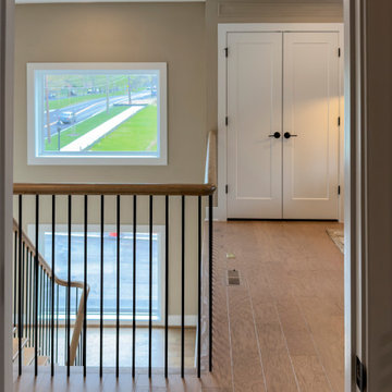 Project #153 | Sophisticated Red Oak Stair with Metal Balusters