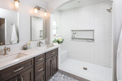Example of a small classic master white tile and ceramic tile cement tile floor, multicolored floor and double-sink bathroom design in San Diego with furniture-like cabinets, dark wood cabinets, a one-piece toilet, white walls, an undermount sink, quartz countertops and a built-in vanity