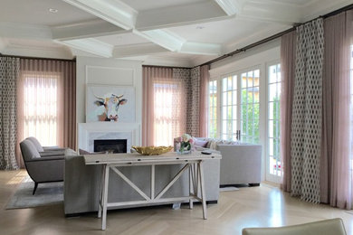Example of a large transitional formal and open concept light wood floor and beige floor living room design in New York with white walls, a standard fireplace, a tile fireplace and no tv