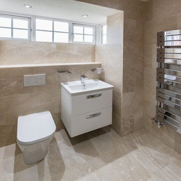 Botticino bespoke glass shower size increase project