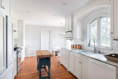 Example of a large french country kitchen design in Atlanta