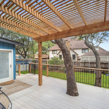 Cedar pergola, composite deck, metal railing with cedar posts