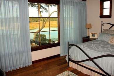 Example of a beach style bedroom design in Austin