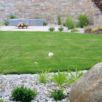 Gartenumgestaltung mit Naturstein und viel Raum