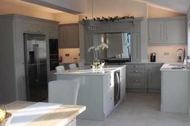 Inspiration for a contemporary kitchen remodel in Other with an island