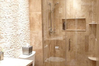 Photo of a contemporary bathroom in Philadelphia with travertine.