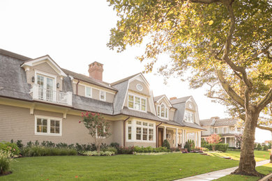 Huge coastal gray two-story wood house exterior idea in New York with a gambrel roof and a shingle roof