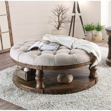 Bowery Hill Rustic Wood Round Tufted Coffee Table in Antique Oak