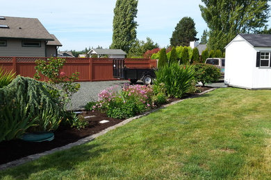 Example of a mid-sized classic one-story exterior home design in Seattle