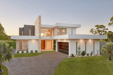 Großes, Zweistöckiges Modernes Einfamilienhaus mit Backsteinfassade, gelber Fassadenfarbe, Flachdach und Blechdach in Sydney