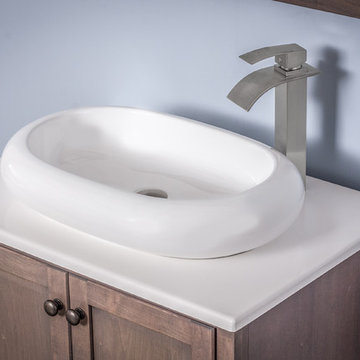 Novatto BIANCO OVALE Vessel Sink with Novatto ECLIPSE faucet.