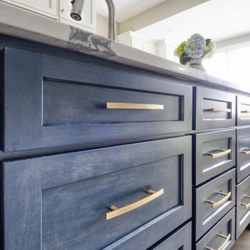 Navy Stained Island, Hood vent and Floating Shelves in White Shaker Kitchen