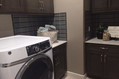 Example of a trendy laundry room design in Orange County