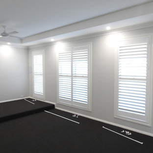 Example of a minimalist home theater design in Newcastle - Maitland