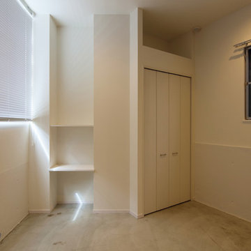 三角形の敷地に建つ10戸の賃貸マンション