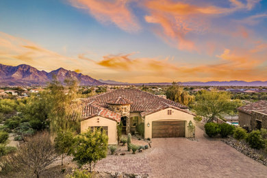 Inspiration for a mediterranean exterior home remodel in Phoenix