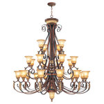 Livex Lighting - Villa Verona Chandelier, Verona Bronze With Aged Gold Leaf Accents - The Villa Verona collection of interior lighting features handsomely styled ironwork complete with scrolling details. This foyer chandelier features a verona bronze finish with aged gold leaf accents and rustic art glass. Display casual, traditional style with this beautiful fixture.