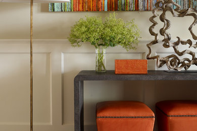 Example of a large transitional dark wood floor entryway design in Charlotte with beige walls and a dark wood front door