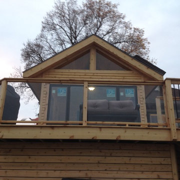 Chain O' Lakes Cedar Room Addition and Cedar Deck with Glass Railing