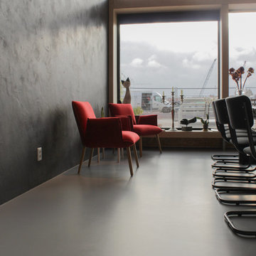 Betonlook gietvloer in combinatie met een minimalistisch interieur